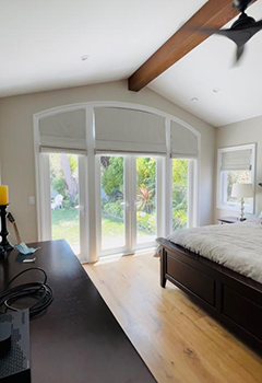 Roman Shades Installation in Stanford's Bright Bedroom