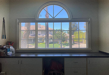 Kitchen with sink and window above it